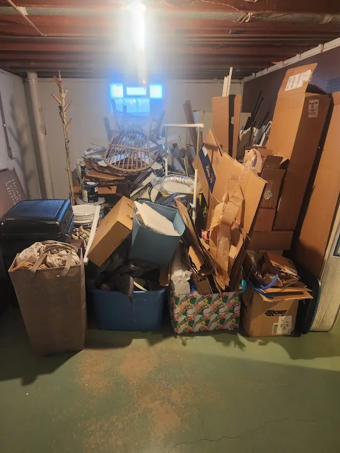 Roll-off dumpster container at job site for 2 Yard Dumpster Rental in Jeannette